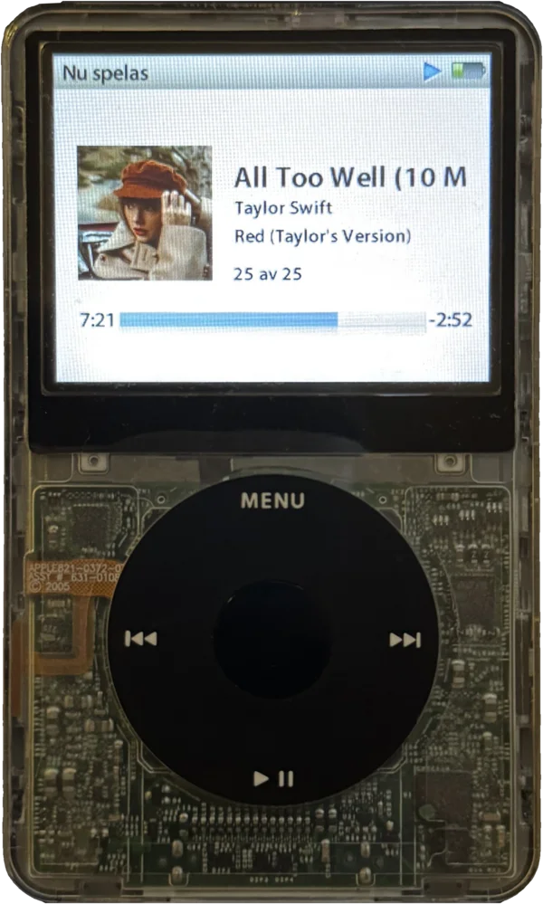 My iPod Video with a transparent front, showing the circuit board inside, playing a song.